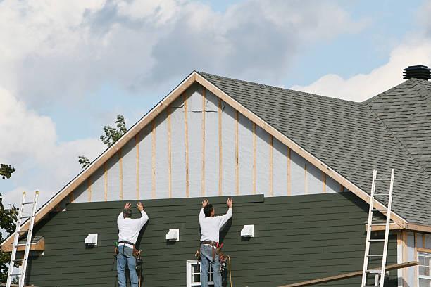 Professional Siding Contractor technician working in East Rochester, NY